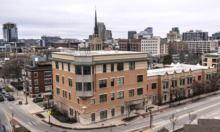 Dégagé Trinity Health housing program shows early progress Crain's Grand Rapids Business